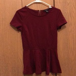 Peplum burgundy top.